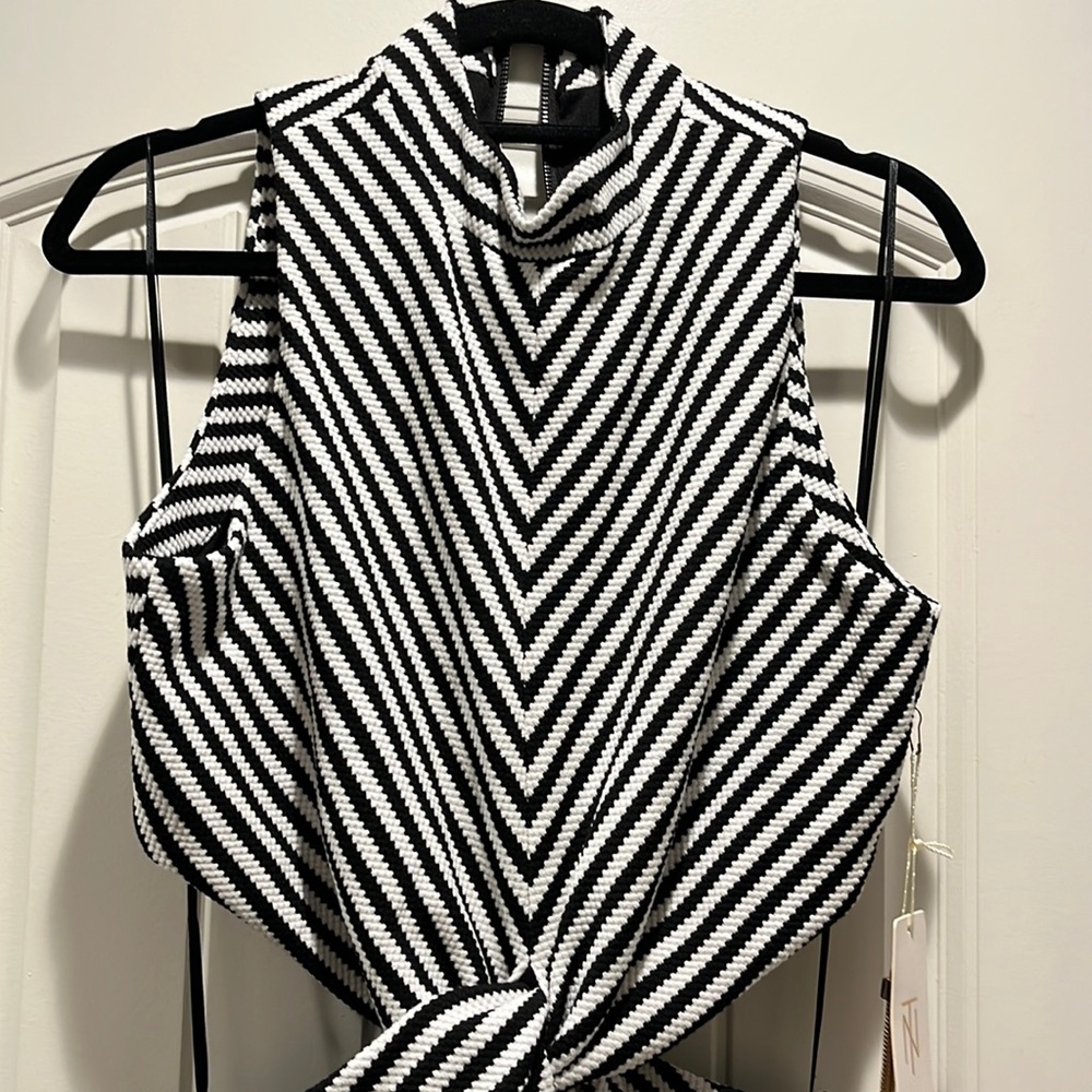 Brand new woman’s dress black and white size large price 60.00